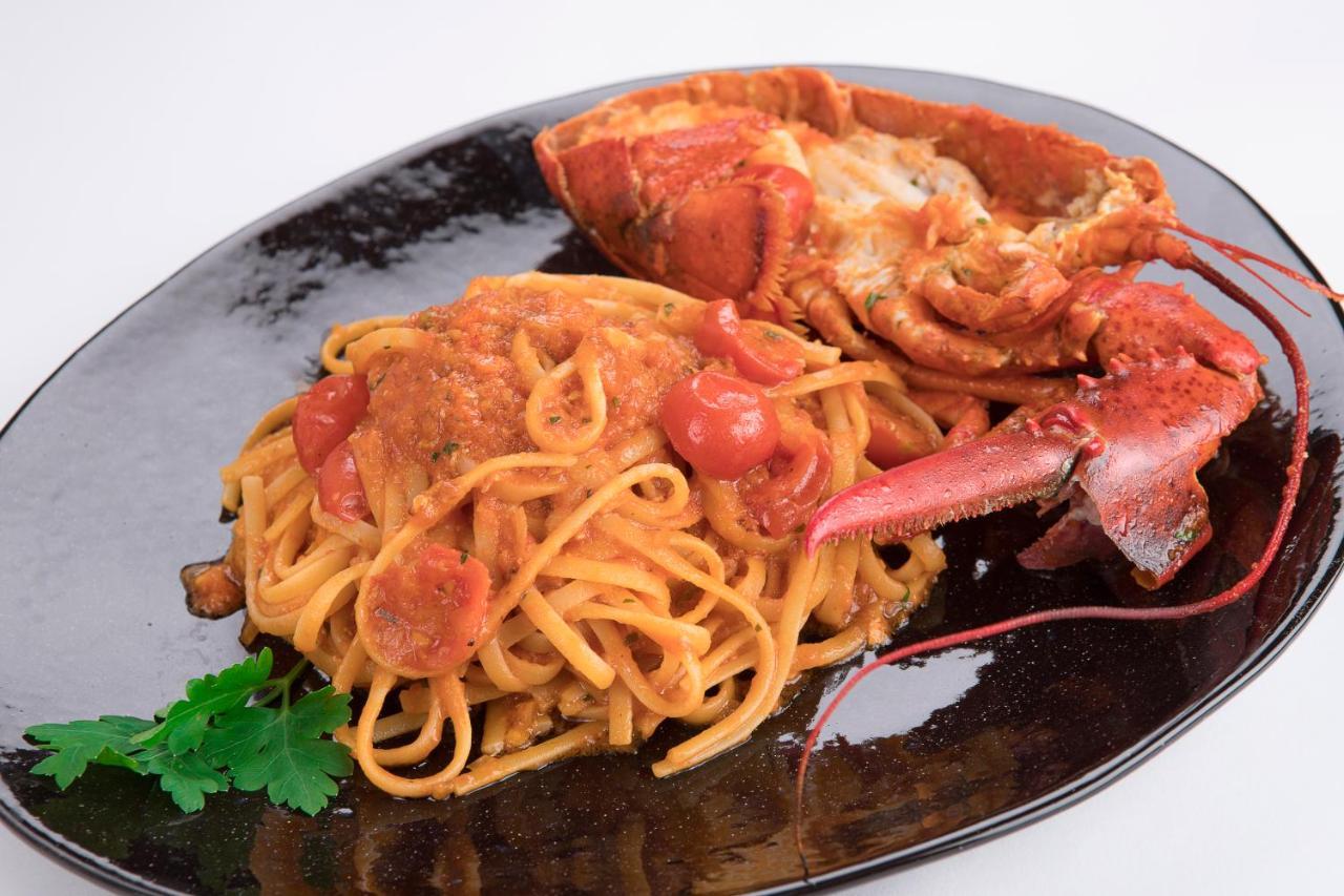 Hotel Ristorante Toscana อาลัสซิโอ ภายนอก รูปภาพ